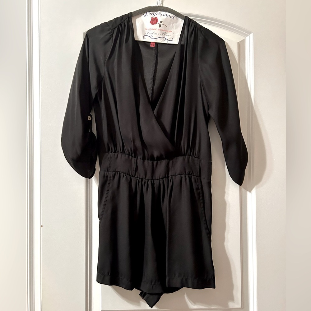 SOLD Barney’s Black silk romper SOLD